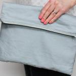 Fold over zipper clutch in ..